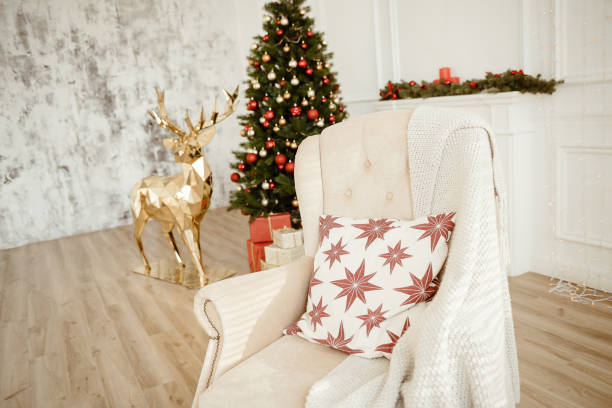 istock Christmas Tree and Christmas gift boxes in the interior with a fireplace. 926472616