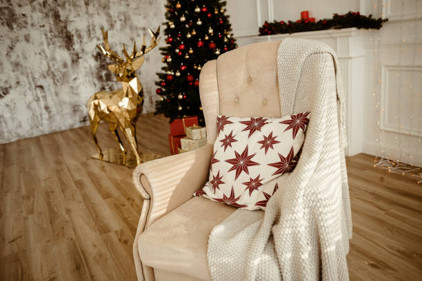 istock Christmas Tree and Christmas gift boxes in the interior with a fireplace. 926472624