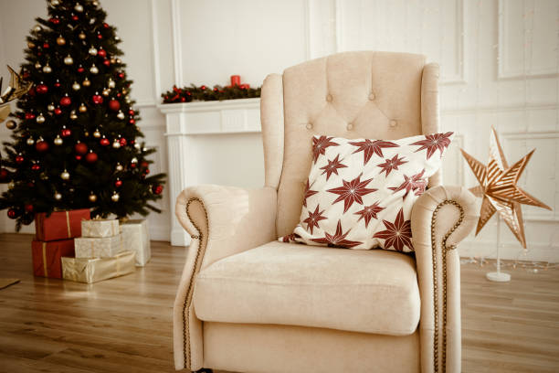 istock Christmas Tree and Christmas gift boxes in the interior with a fireplace. 926472644