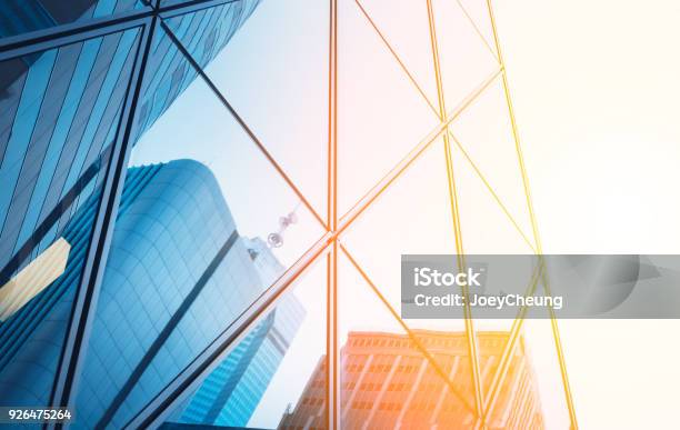 Reflections Of Modern Commercial Buildings On Glasses With Sunlight Stock Photo - Download Image Now