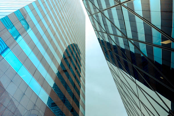 istock Reflections of modern commercial buildings on glasses 926475358