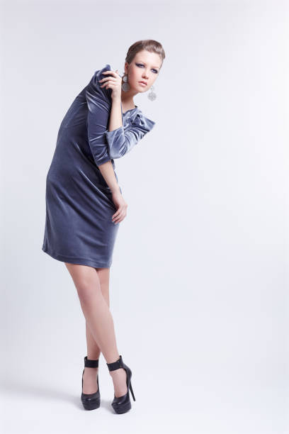 istock stylish brunette in dress 926483500
