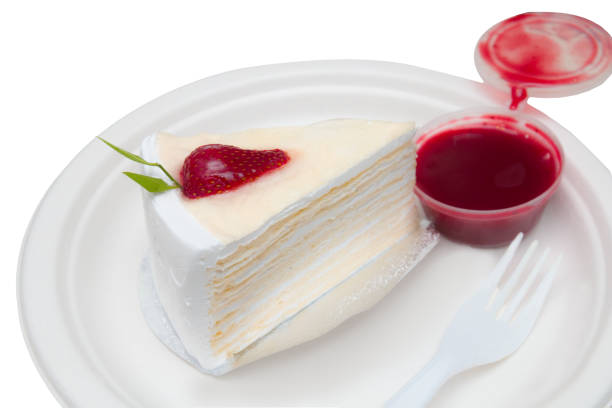 istock Crepe cake bakery piece with strawberry sauce 926483602