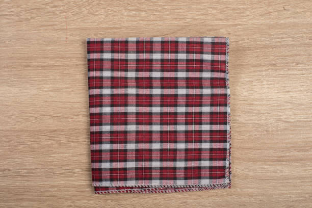 istock Red table napkins isolated on white background . 926486354