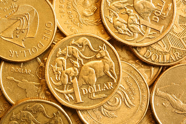 Background of Australian One Dollar Coins  australian dollar stock pictures, royalty-free photos & images