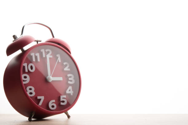 istock Red alarm clock isolated on white background. Business time concept. 926487452