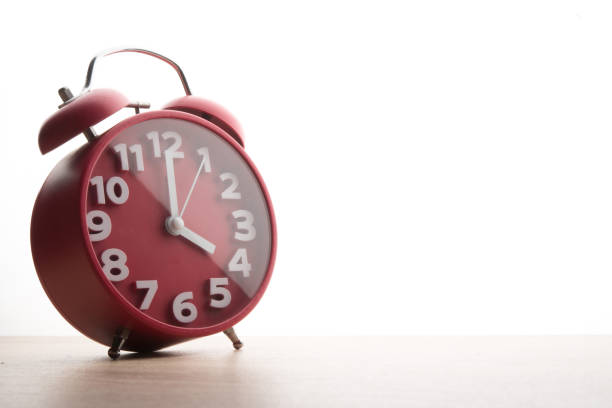 istock Red alarm clock isolated on white background. Business time concept. 926487508