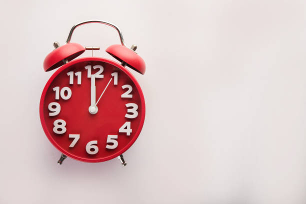 istock Red alarm clock isolated on white background. Business time concept. 926487760