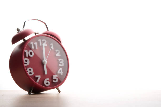 istock Red alarm clock isolated on white background. Business time concept. 926487922