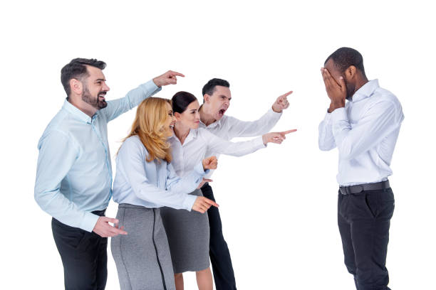 istock Wicked colleagues mocking at their co-worker 926490230