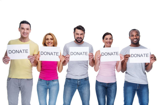 istock Inspired women and men asking for donation 926490428