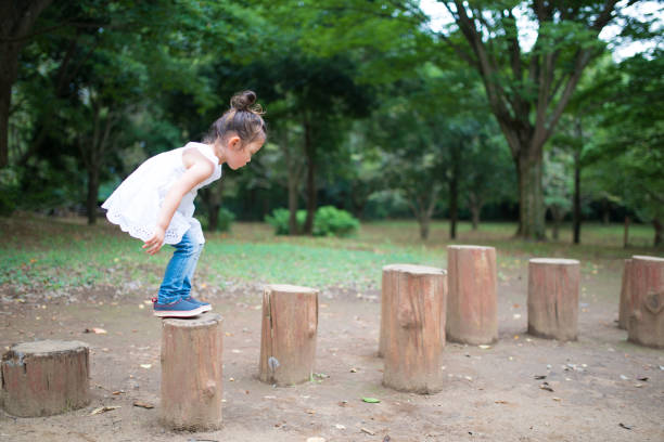 Little girl playing in the park