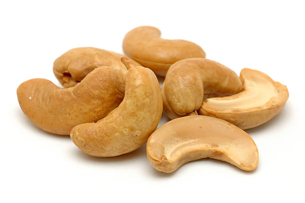 Pile of cashew nuts  cashew photos stock pictures, royalty-free photos & images
