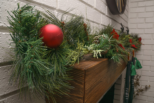 Christmas wreath on fireplace mantle