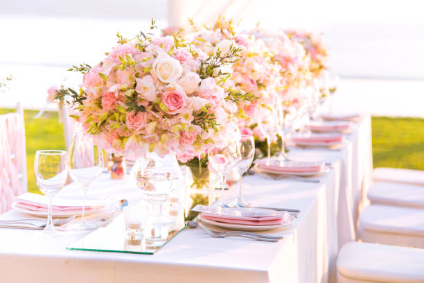 istock Table setting at a luxury wedding and Beautiful flowers on the table. 926495128