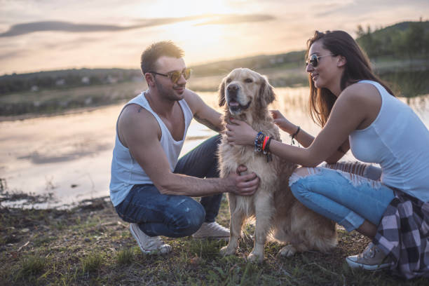 istock Loving couple with dog 926498072