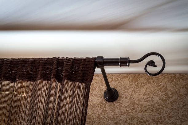 A view of the cornice with curtains in a cozy room