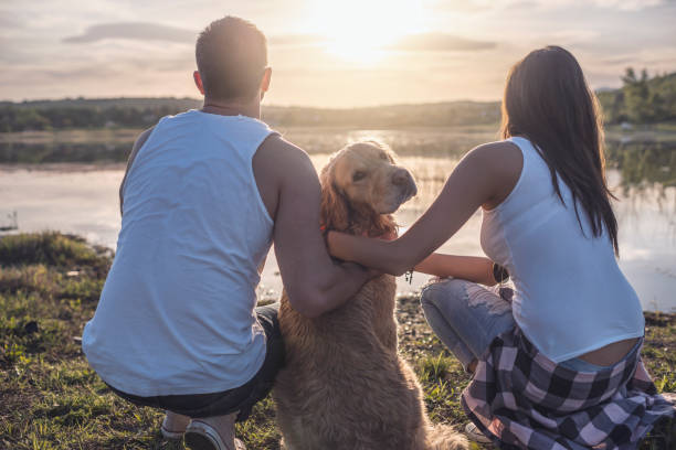 istock Loving couple with dog 926510324