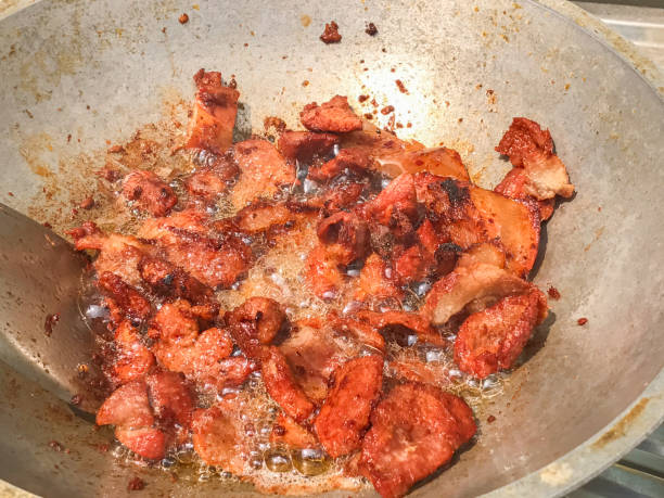 istock deep fried pork meat frying on cooking pan 926518230