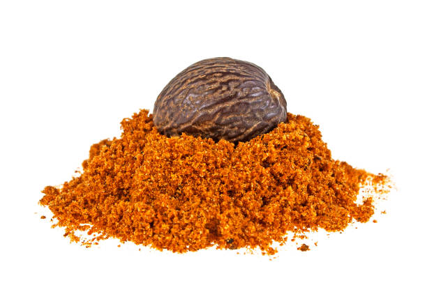 istock Whole and grated nutmeg isolated on white background 926521368