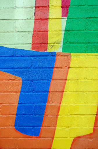 Brick wall painted with coloured paint. See other image: