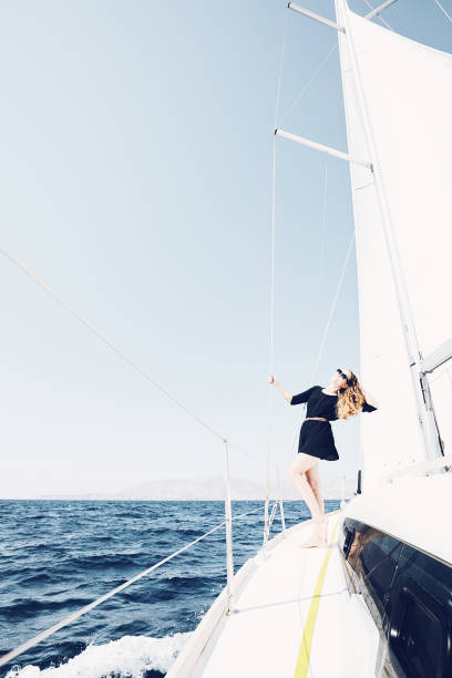 istock Girl on sailing boat 926523542