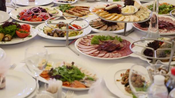 istock Table full of food. Served tables in restaurant 926523564
