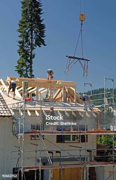 Working Roofers Stock Photo - Download Image Now - Construction Site, Detached House, Rooftop