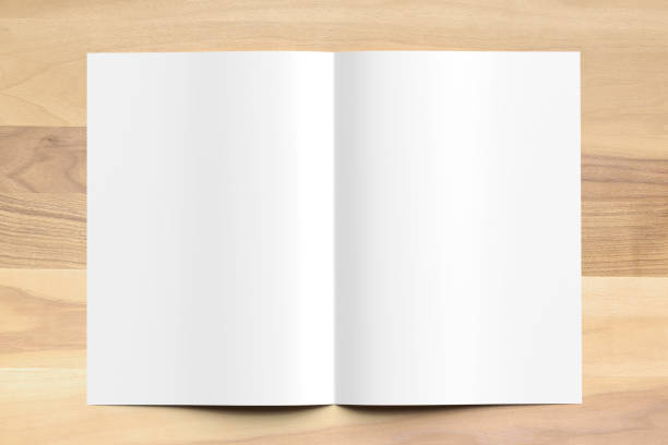 istock Blank Bi fold A4 size brochure mock up on wooden background. 3D illustrating. 926533030