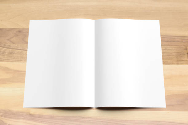 istock Blank Bi fold A4 size brochure mock up on wooden background. 3D illustrating. 926533570