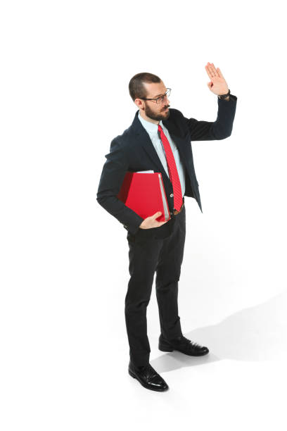 istock Choose me. Full body view of businessman with red folder on white studio background 926534346