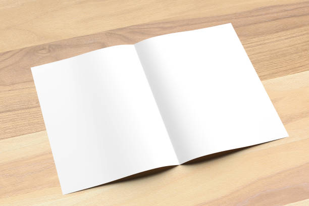 istock Blank Bi fold A4 size brochure mock up on wooden background. 3D illustrating. 926534566
