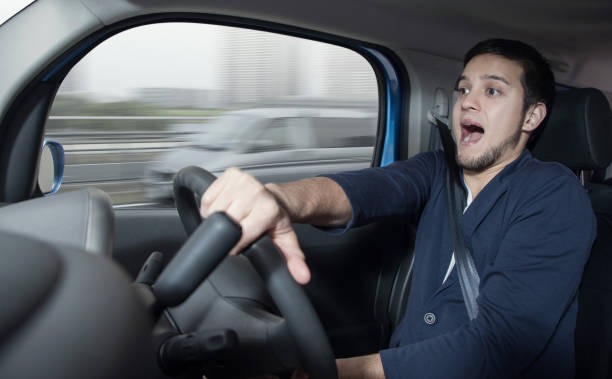 Surprised driver in the car. Car accident. Abrupt steering. Surprised driver in the car. Car accident. Abrupt steering. pileup stock pictures, royalty-free photos & images