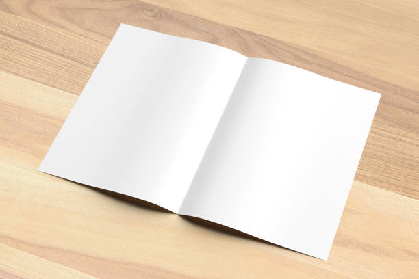 istock Blank Bi fold A4 size brochure mock up on wooden background. 3D illustrating. 926537462