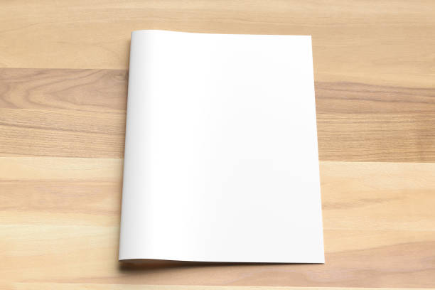 istock Blank Bi fold A4 size brochure mock up on wooden background. 3D illustrating. 926542358