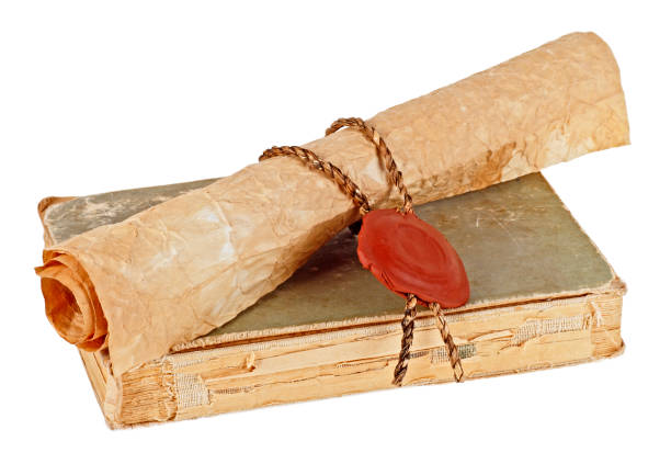 istock Old book and vintage paper scroll isolated on white background 926542924