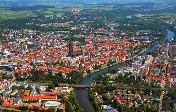 Closer Aerial view of Ulm Minster (Ulmer Münster) and Ulm, south germany on a sunny summer day Closer Aerial view of Ulm Minster (Ulmer Münster) and Ulm, south germany on a sunny summer day ulm minster stock pictures, royalty-free photos & images