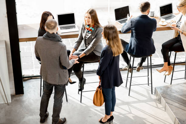 istock Business people talking indoors 926547404