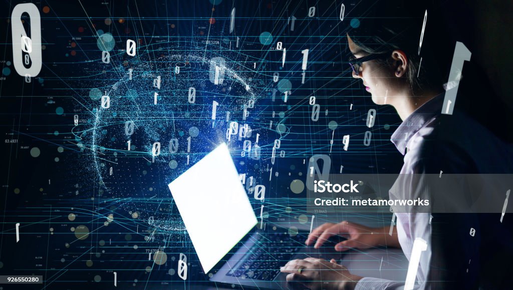 Woman using laptop and digital communication network concept. Computer Programmer Stock Photo