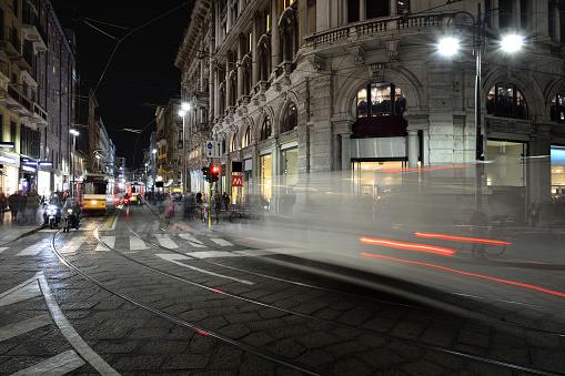 Milan's cityscape at midnight, Italy.