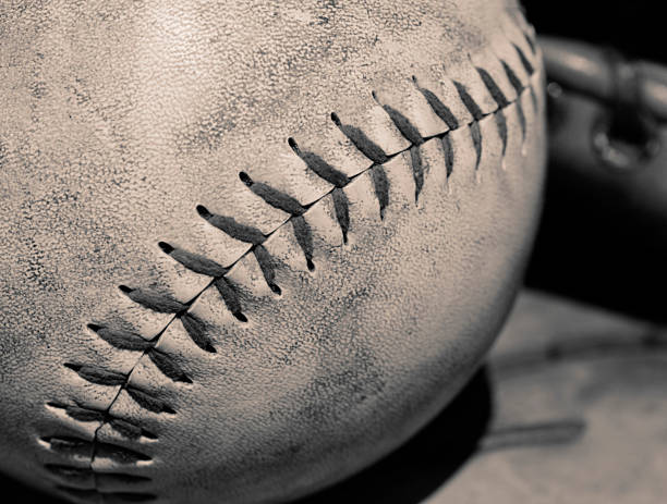 istock Sepia closeup of the stitching in a baseball. 92655182