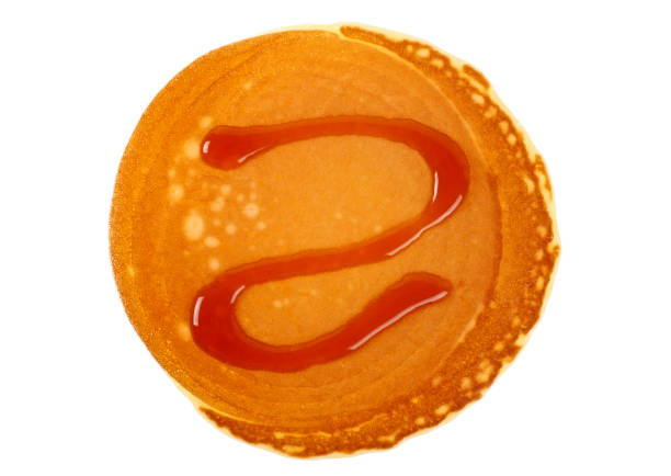 A Cartoon Illustration of Pancakes With Honey.