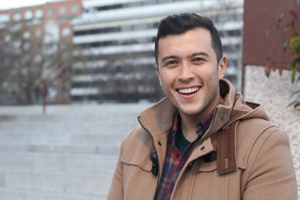 istock Handsome mixed race male smiling outdoors 926560020