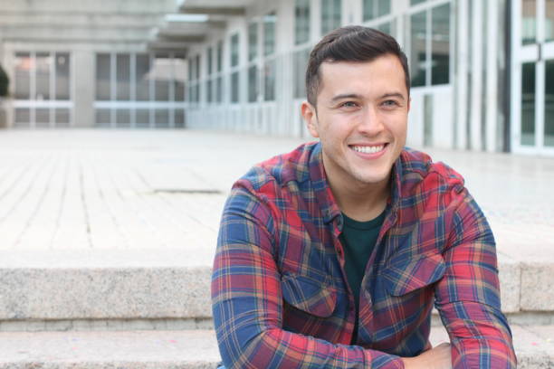 istock Handsome mixed race male smiling isolated 926560236