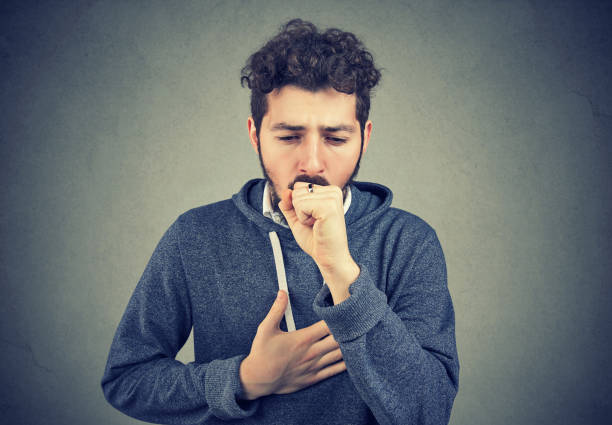 istock Sick man coughing with pain 926566576