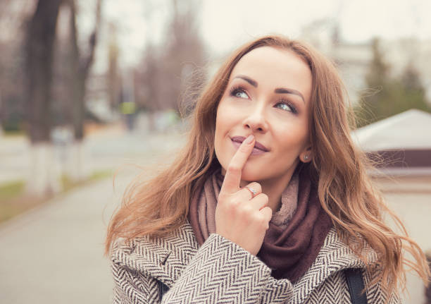 istock Charming dreaming girl on street 926567036