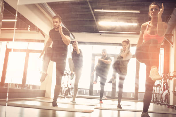 istock Group of young people exercise. On the move. 926569792