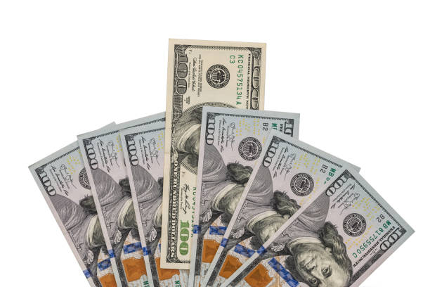 istock Isolated hundred dollar bills on a white background 926570076
