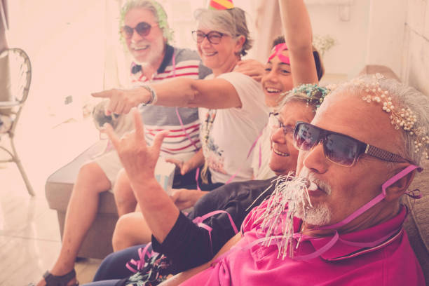 istock family celebrates at home with hats 926570412