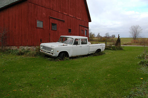 istock Old truck and barn 92657354
